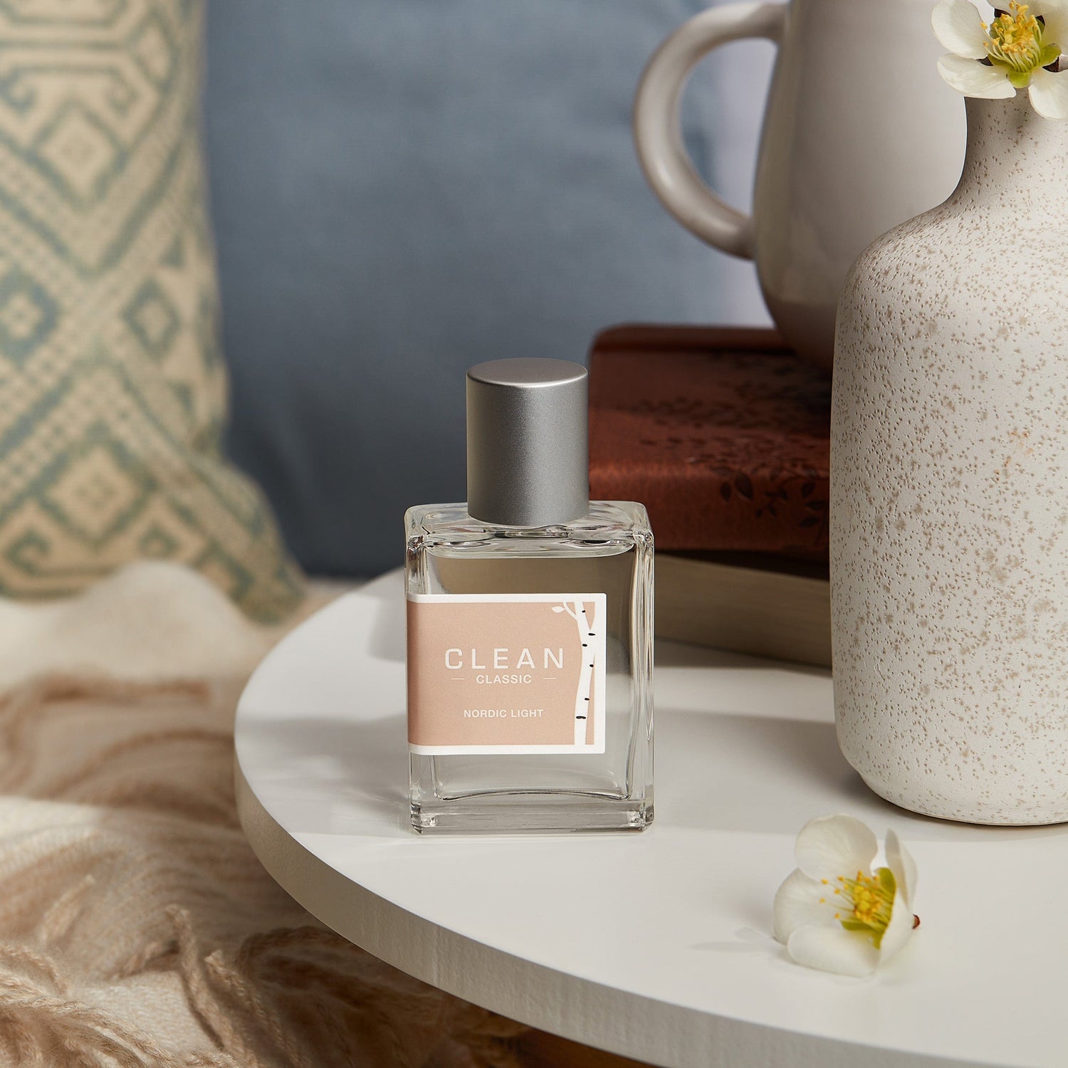 Clean Classic Nordic Light fragrance on night stand