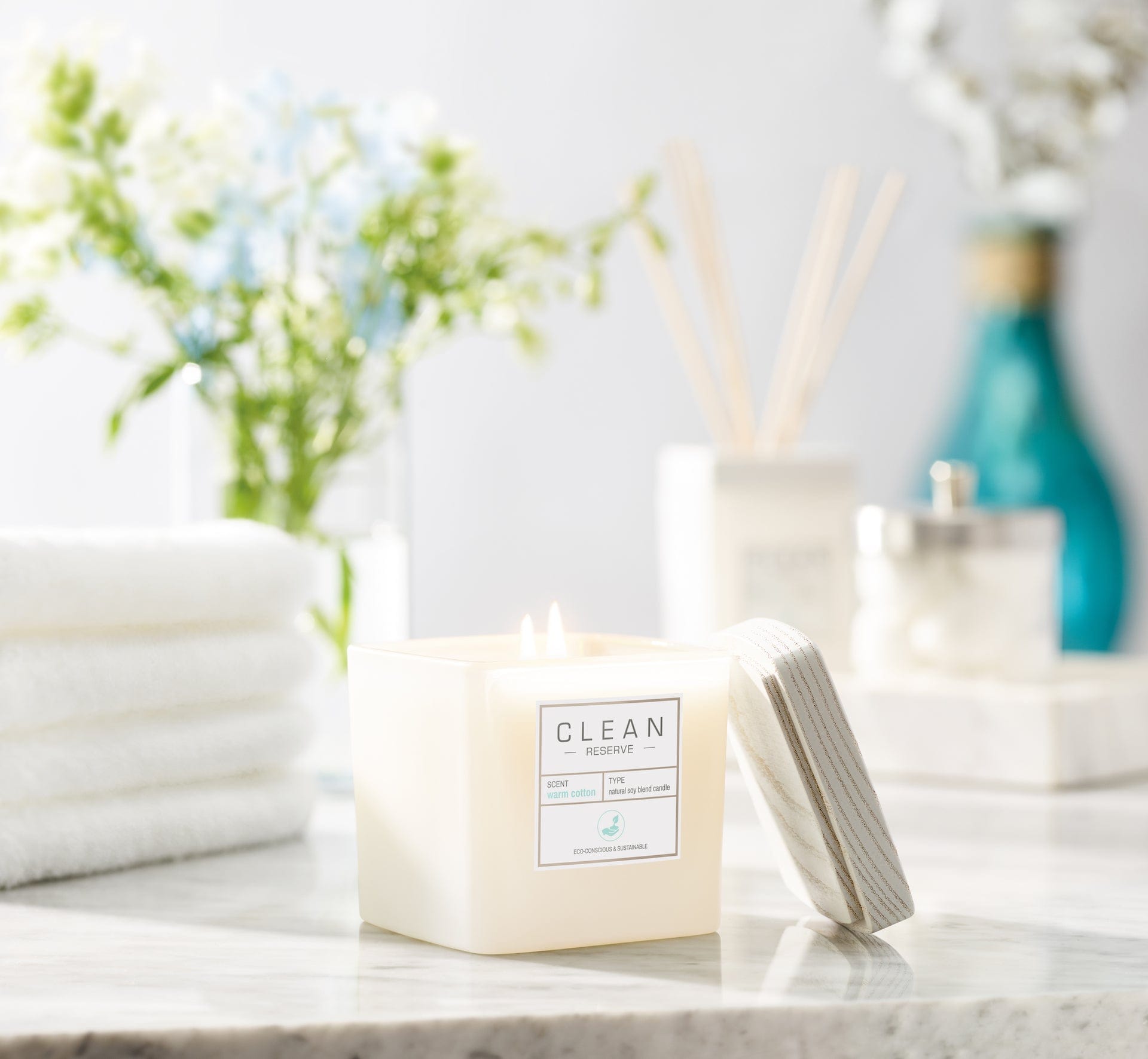 clen reserve Warm Cotton Natural Soy Blend Candle in bathroom