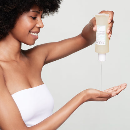 model with Clean Reserve Buriti &amp; Aloe Purifying Body Wash